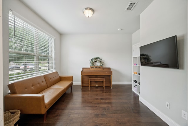 7717 Lake Worth Cv, Mckinney, TX 75071 - sitting room with dark wood-style floors and baseboards