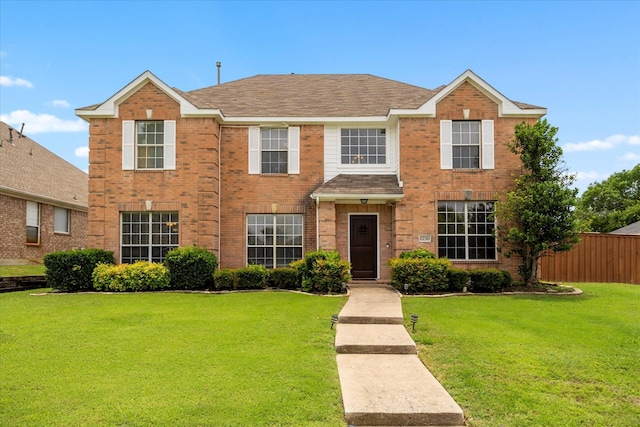 1230 Donegal Ln, Garland, TX 75044 - view of front facade featuring brick siding and roof with shingles