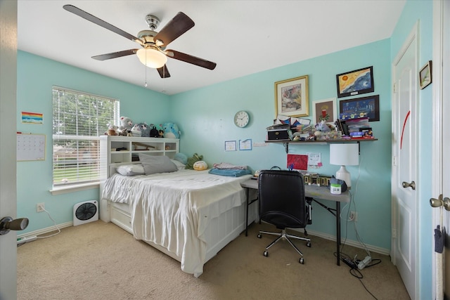 1230 Donegal Ln, Garland, TX 75044 - bedroom with carpet, baseboards, and a ceiling fan
