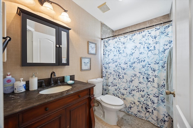 1230 Donegal Ln, Garland, TX 75044 - full bath with tile patterned floors, vanity, toilet, and a shower with curtain