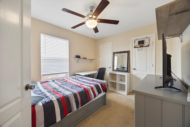 1230 Donegal Ln, Garland, TX 75044 - bedroom with light colored carpet and ceiling fan