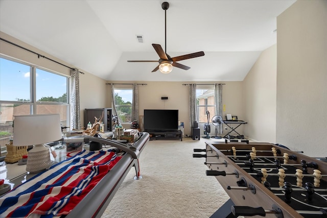 1230 Donegal Ln, Garland, TX 75044 - recreation room with vaulted ceiling, ceiling fan, healthy amount of natural light, and carpet