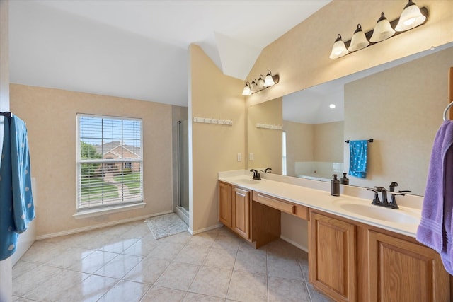 1230 Donegal Ln, Garland, TX 75044 - bathroom with lofted ceiling, double vanity, baseboards, a shower with door, and tile patterned flooring