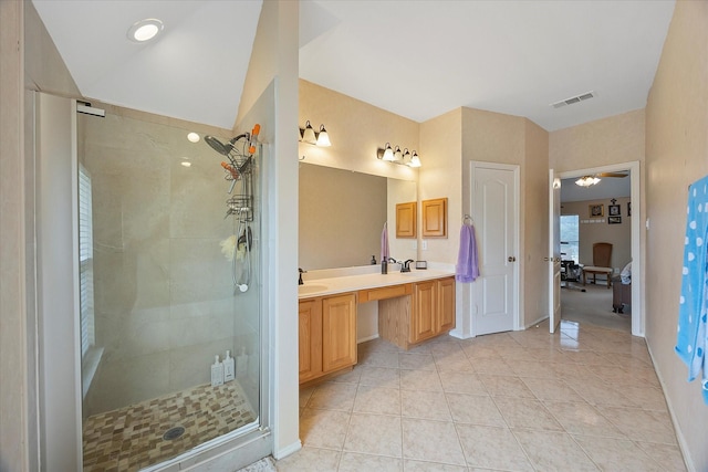 1230 Donegal Ln, Garland, TX 75044 - full bathroom featuring double vanity, a stall shower, tile patterned floors, and baseboards