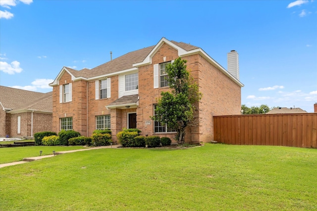 1230 Donegal Ln, Garland, TX 75044 - view of front of house featuring brick siding and a chimney