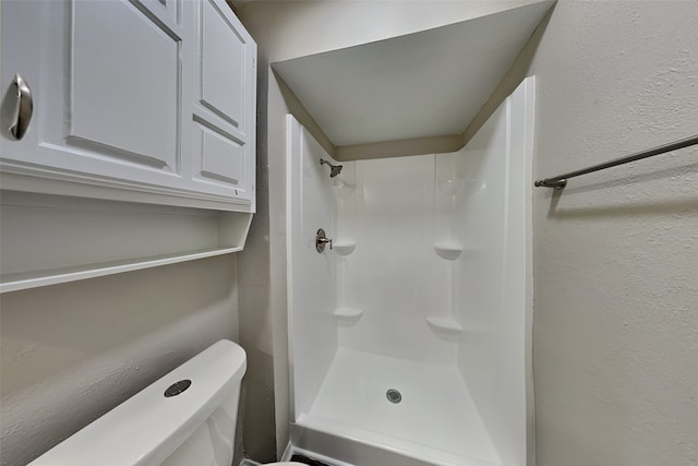 4804 Jennings Cir, The Colony, TX 75056 - bathroom featuring toilet and a shower
