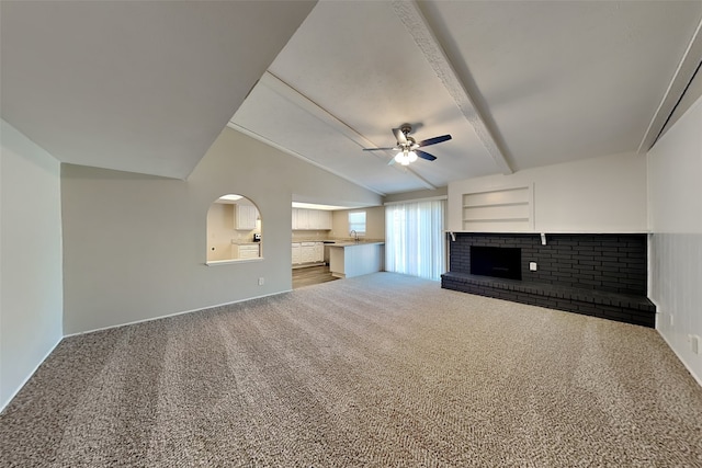 4804 Jennings Cir, The Colony, TX 75056 - unfurnished living room with ceiling fan, a brick fireplace, carpet floors, and baseboards