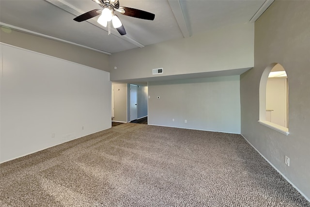 4804 Jennings Cir, The Colony, TX 75056 - carpeted spare room featuring beam ceiling, a ceiling fan, arched walkways, and a high ceiling