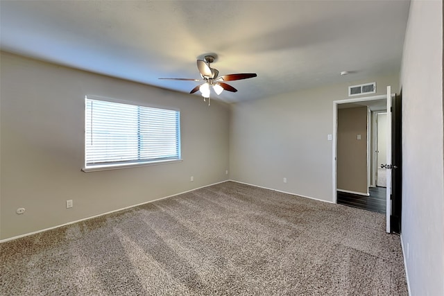 4804 Jennings Cir, The Colony, TX 75056 - empty room with a ceiling fan, carpet floors, and baseboards
