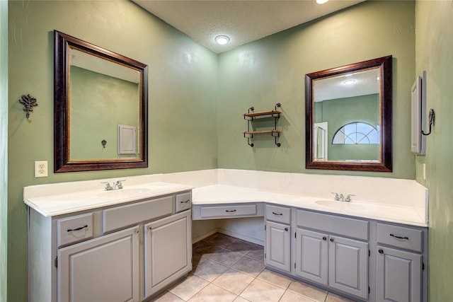 6613 Springmeadow Ln, Rowlett, TX 75089 - full bath with vanity, tile patterned flooring, and a textured ceiling