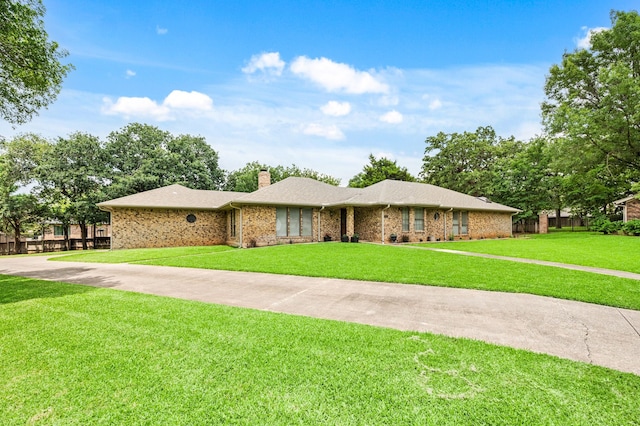 7213 Maranatha Ct, Colleyville, TX 76034 - view of front of property featuring a chimney, a front yard, and brick siding