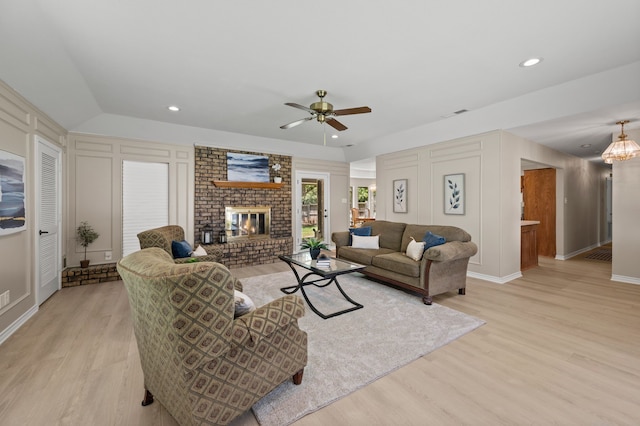 7213 Maranatha Ct, Colleyville, TX 76034 - living room with light wood-style floors, a fireplace, a ceiling fan, lofted ceiling, and recessed lighting