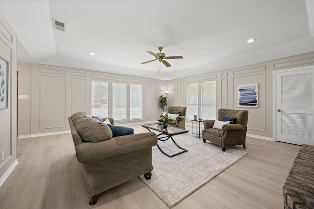 7213 Maranatha Ct, Colleyville, TX 76034 - living room featuring a decorative wall, healthy amount of natural light, ceiling fan, light wood finished floors, and recessed lighting