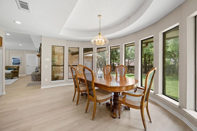 7213 Maranatha Ct, Colleyville, TX 76034 - dining area with healthy amount of natural light, a chandelier, recessed lighting, baseboards, and light wood-type flooring
