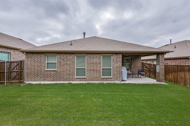 3822 Brazos St, Melissa, TX 75454 - rear view of house with brick siding, a patio area, and a shingled roof