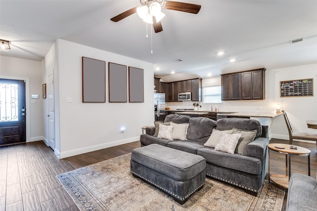 3822 Brazos St, Melissa, TX 75454 - living area featuring ceiling fan, baseboards, dark wood finished floors, and recessed lighting