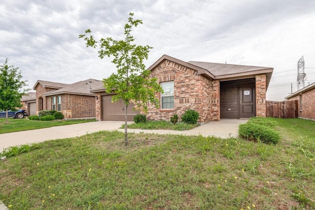 1937 Duskwood Dr, Lancaster, TX 75146 - single story home with brick siding, concrete driveway, and an attached garage
