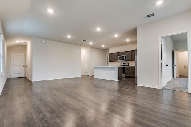1937 Duskwood Dr, Lancaster, TX 75146 - unfurnished living room with recessed lighting and dark wood-type flooring