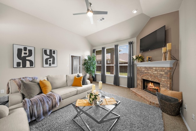 334 Hawthorn Dr, Fate, TX 75087 - carpeted living area with vaulted ceiling, a ceiling fan, and a brick fireplace