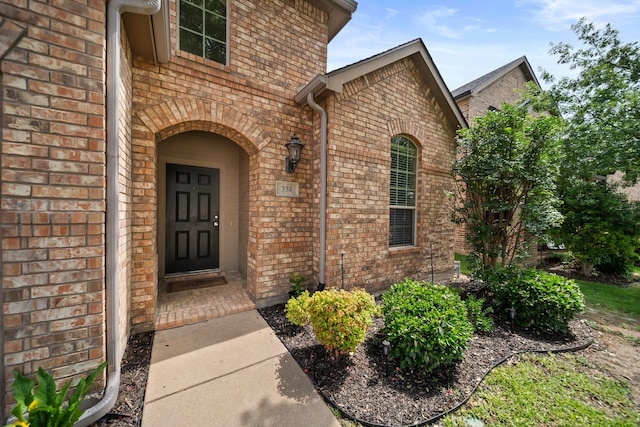 334 Hawthorn Dr, Fate, TX 75087 - property entrance featuring brick siding