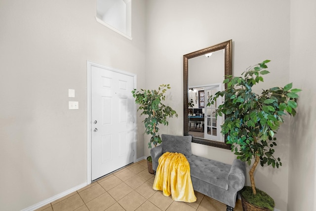 334 Hawthorn Dr, Fate, TX 75087 - tiled foyer with baseboards and a high ceiling