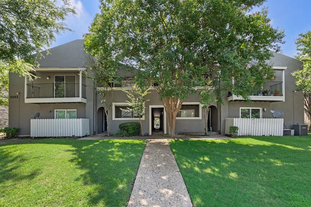 5003 Skillman St Unit 109A, Dallas, TX 75206 - townhome / multi-family property with a balcony, stucco siding, and central air condition unit