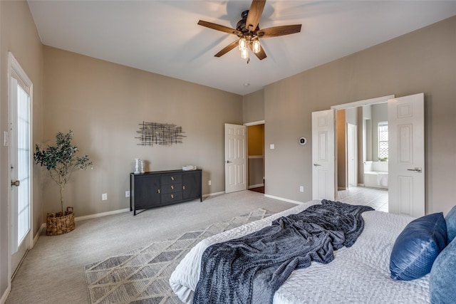 8250 Library St, Frisco, TX 75034 - bedroom with light colored carpet, baseboards, ensuite bath, and a ceiling fan