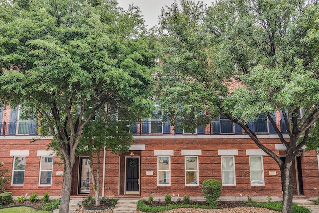 8250 Library St, Frisco, TX 75034 - multi unit property with brick siding and a balcony