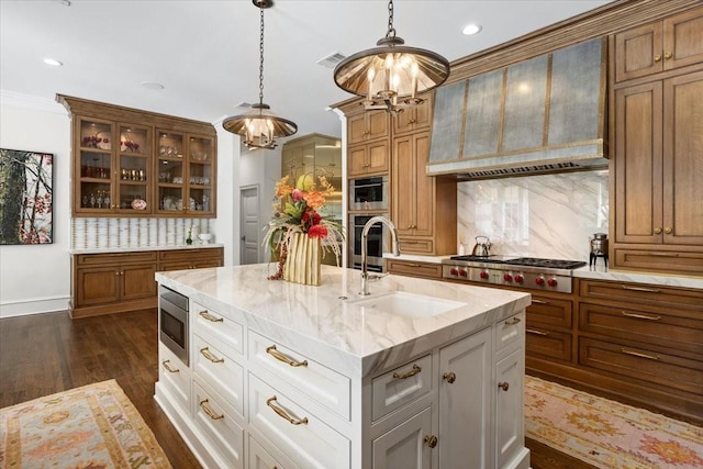 1128 Shady Oaks Ln, Westover Hills, TX 76107 - kitchen featuring a sink, appliances with stainless steel finishes, tasteful backsplash, glass insert cabinets, and brown cabinetry