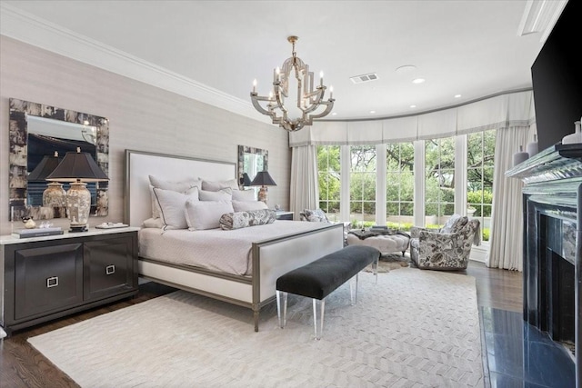 1128 Shady Oaks Ln, Westover Hills, TX 76107 - bedroom with a chandelier, a fireplace, recessed lighting, and ornamental molding