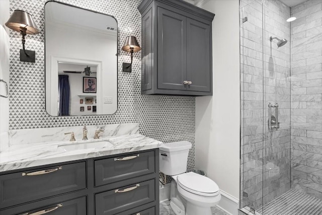 1128 Shady Oaks Ln, Westover Hills, TX 76107 - bathroom featuring vanity, a stall shower, toilet, and crown molding