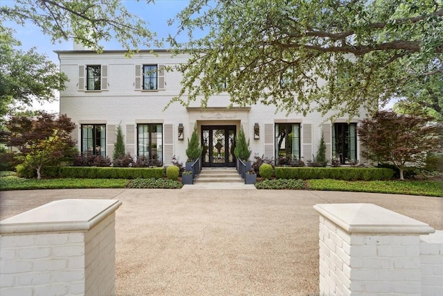 1128 Shady Oaks Ln, Westover Hills, TX 76107 - view of front of house featuring french doors and brick siding