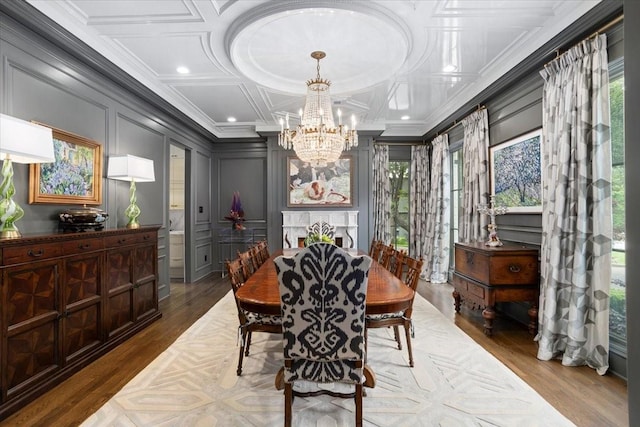 1128 Shady Oaks Ln, Westover Hills, TX 76107 - dining room with a chandelier, a decorative wall, plenty of natural light, wood finished floors, and ornamental molding
