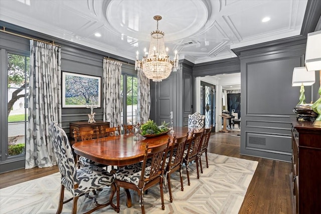 1128 Shady Oaks Ln, Westover Hills, TX 76107 - dining room featuring ornamental molding, a decorative wall, a chandelier, coffered ceiling, and wood finished floors