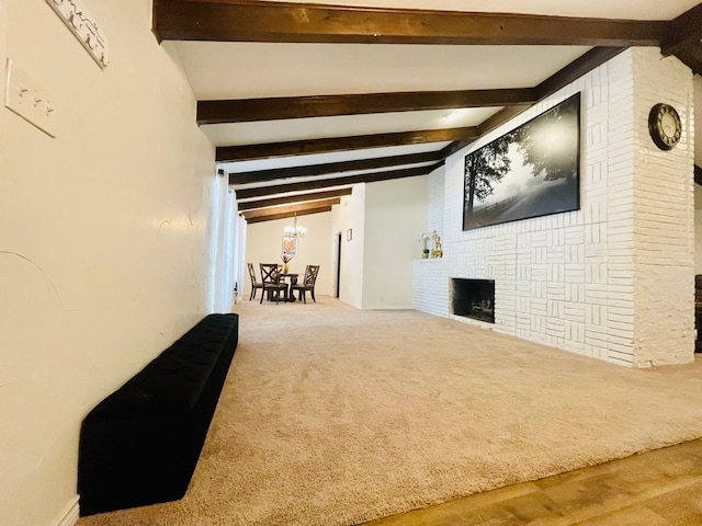 2605 Twinpost Ct, Irving, TX 75062 - below grade area featuring a large fireplace, wood finished floors, and a chandelier