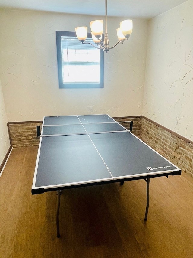 2605 Twinpost Ct, Irving, TX 75062 - rec room with wood finished floors and a chandelier