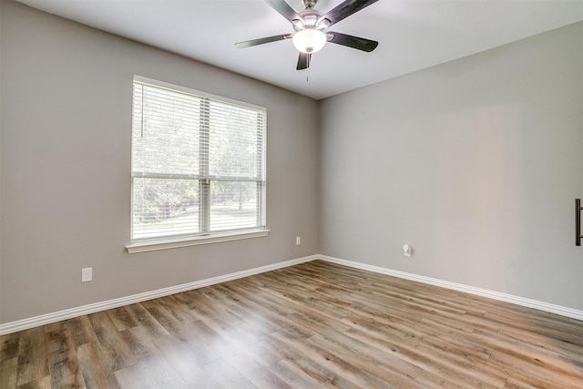 430 Mitchell Blvd, Weatherford, TX 76087 - spare room with plenty of natural light, wood finished floors, baseboards, and ceiling fan