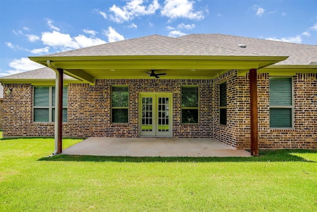 430 Mitchell Blvd, Weatherford, TX 76087 - rear view of property with a ceiling fan, brick siding, a lawn, roof with shingles, and a patio