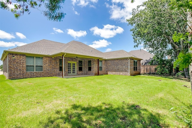 430 Mitchell Blvd, Weatherford, TX 76087 - rear view of property featuring french doors, brick siding, and roof with shingles