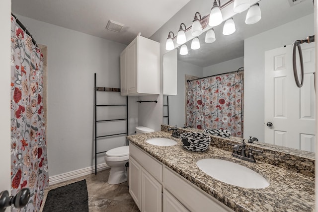 2508 Springhill Dr, Grapevine, TX 76051 - bathroom featuring toilet, double vanity, baseboards, tile patterned floors, and a shower with shower curtain