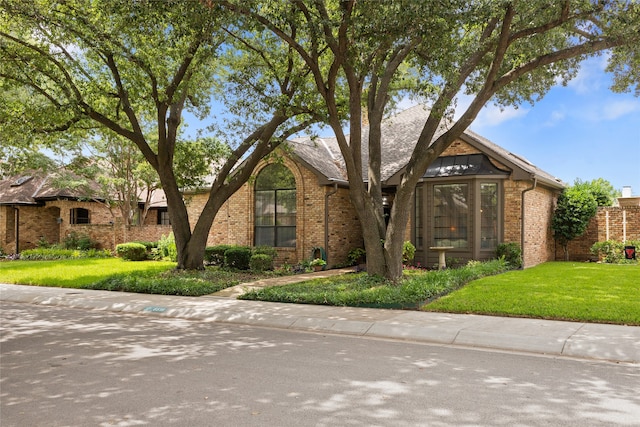 6518 Laurel Valley Rd, Dallas, TX 75248 - view of front of house featuring brick siding and a front yard