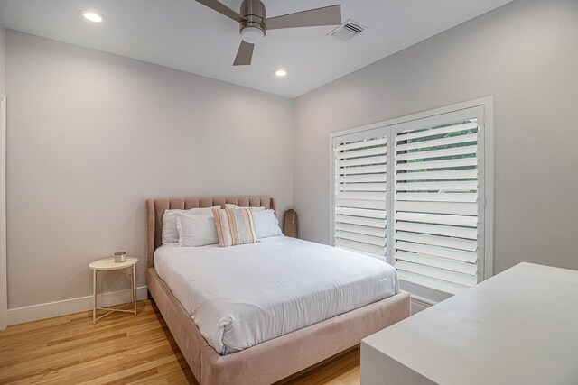 724 E Bluff St, Fort Worth, TX 76102 - bedroom with light wood-type flooring, baseboards, recessed lighting, and ceiling fan