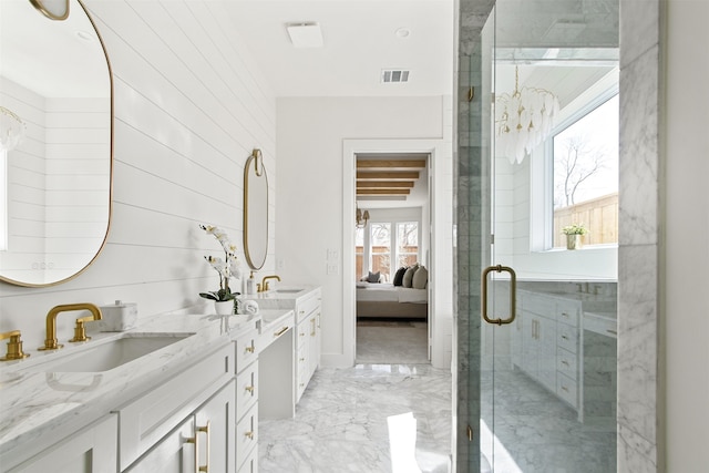 9974 Witham St, Dallas, TX 75220 - bathroom featuring double vanity, marble finish floors, a shower stall, ensuite bath, and wood walls