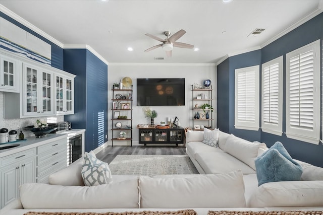 1705 Bison Meadow Ln, Heath, TX 75032 - living room featuring ceiling fan, wood finished floors, ornamental molding, recessed lighting, and baseboards