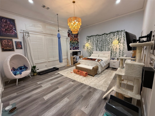 1705 Bison Meadow Ln, Heath, TX 75032 - bedroom featuring wood finished floors, crown molding, and a chandelier