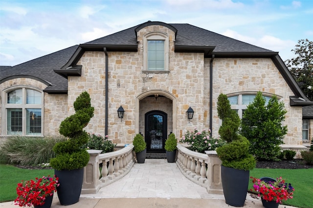 1705 Bison Meadow Ln, Heath, TX 75032 - view of front of property with stone siding and roof with shingles