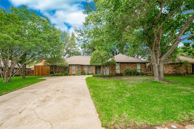 2212 Creekwood Ct, Flower Mound, TX 75028 - view of front of house featuring driveway, brick siding, and roof with shingles