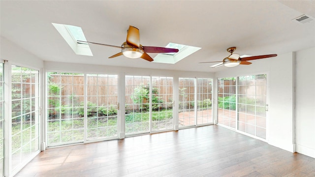 2212 Creekwood Ct, Flower Mound, TX 75028 - unfurnished sunroom featuring a skylight and healthy amount of natural light
