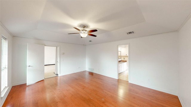 2212 Creekwood Ct, Flower Mound, TX 75028 - spare room with a ceiling fan, light wood-type flooring, and baseboards