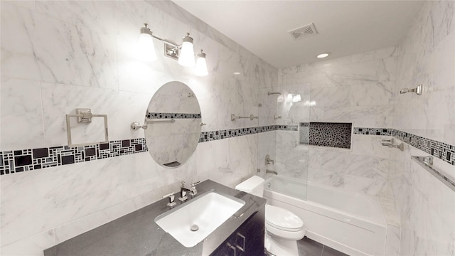 2212 Creekwood Ct, Flower Mound, TX 75028 - full bathroom featuring vanity,  shower combination, toilet, and tile walls